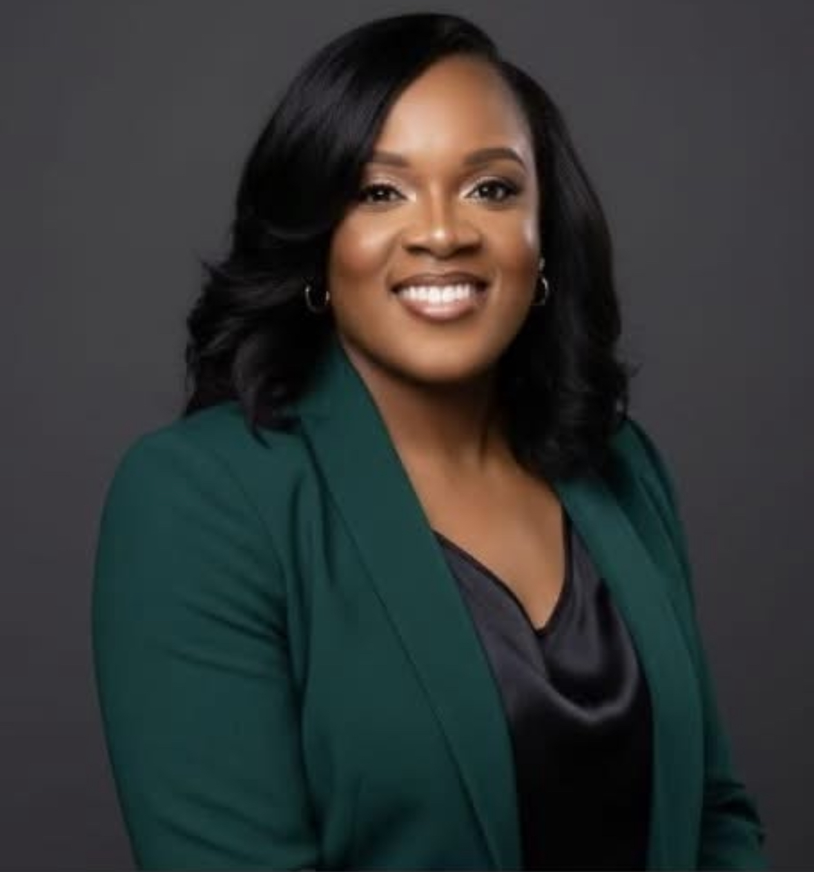 Monika Hicks in a green blazer